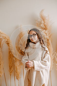 people, style and fashion concept - happy young woman or teen girl in casual clothes and hipster hat.