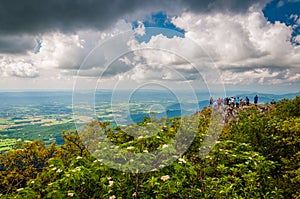 People on the summit of Stony Man Mountain and view of the Shenandoah Valley, in Shenandoah National Park, Virginia.