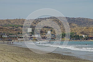 People swiming in Pacific ocean in Mancora surfer's beach in Per