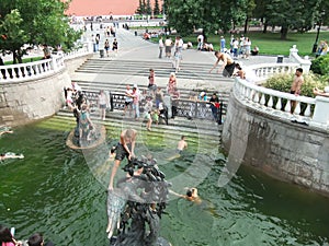 People swimming in a fountain, Alexander Gardens, Moscow, Russia