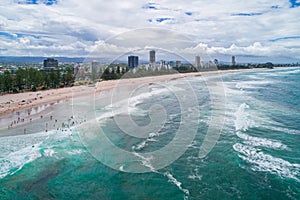 People swimming in the ocean.