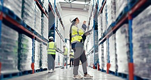 People, tablet and logistics in storage inspection, inventory or checking stock together at warehouse. Group of