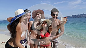 People Take Selfie Photo On Cell Smart Phone On Beach, Happy Smiling Young Tourists Group On Vacation