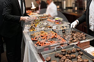 People Taking Food in Buffet Catering Dining Eating Party. Event Buffet Concept