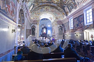 People taking part at the Sunday mass in Chiesa di San Rocco photo