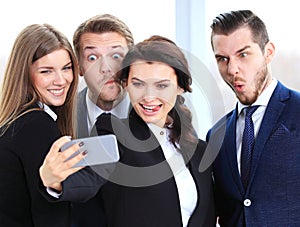 People taking selfie at businessmeeting