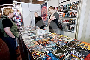 People talk about comic books at graphic novels stand