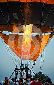 People testing balloon burner of an aerostat.