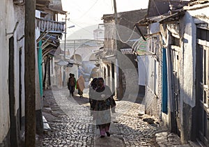 People in their morning routine activities that almost unchanged in more than four hundred years. Harar. Ethiopia.