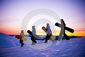 People On Their Way To Snow Boarding photo