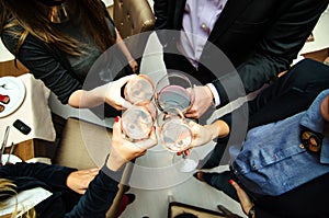 People toasting with wine photo