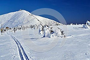 People and tourist hostels in winter in the Giant Mountains