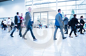 People at a trade fair hall