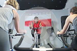 People training on static cycles