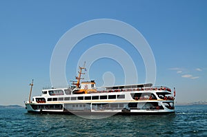 People travel with cruise ship in Istanbul Strait.