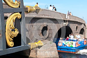 People travel in excursion boat in the center of St Petersburg