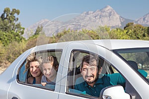 People traveling by Car expressing happiness and excitement