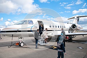 People Travelling by Commercial Airplane