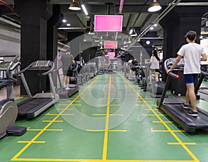 People on treadmills in the sports complex.