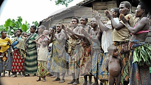 People from a tribe of Baka pygmies in village of ethnic singing. Traditional dance and music. Nov, 2, 2008 CAR
