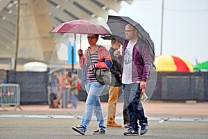 People with umbrellas, under the rain at Heineken Primavera Sound 2014