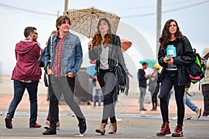 People with umbrellas, under the rain at Heineken Primavera Sound 2014 Festival