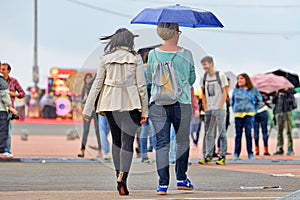 People with umbrellas, under the rain at Heineken Primavera Sound 2014 Festival