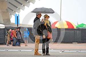 People with umbrellas, under the rain at Heineken Primavera Sound 2014 Festival