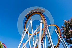 People up side down riding a roller coaster