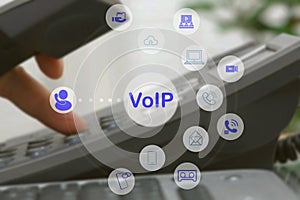 People using IP phone / Smartphone with flying icon of voip services and people connection, Smart VoIP and telecommunication