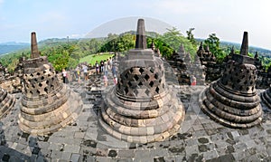 People visit the Borobudur temple in Indonesia