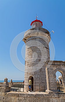 People visiting the old Bugio Lighthouse