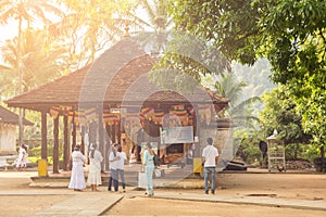 People visiting Temple Of The Sacred Tooth Relic on sri lanka