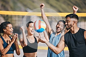 People, volleyball and team celebration on beach for winning, victory or sports achievement in nature. Happy group of