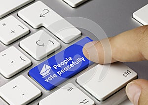 People vote peacefully - Inscription on Blue Keyboard Key