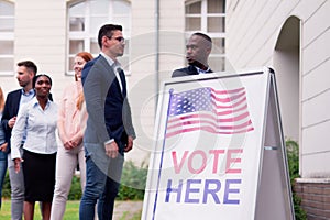 People voting at diverse election booth here