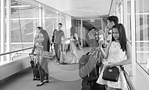 People waiting for boarding at the NAIA airport in Manila, Philippines