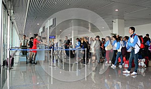 People waiting for boarding at Tan Son Nhat airport in Saigon, Vietnam