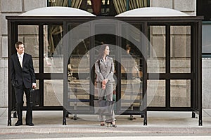 People waiting at bus stop