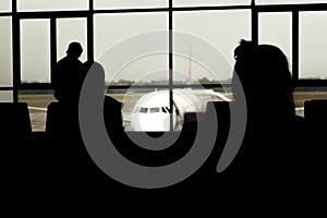 People waiting for the plane at the airport