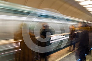 People waiting train in subway