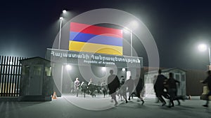 People walk through the border checkpoint gate to the Republic of Armenia - 3D