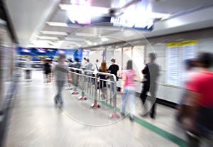 People walk in subway tunnels