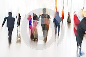 People Walking at Airport in Motion Blur