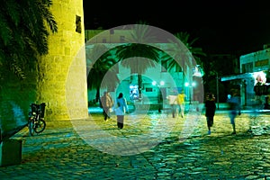 People walking in arabian medina at the night