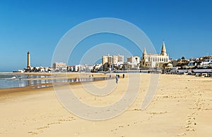 People walking on the beach in Cadiz