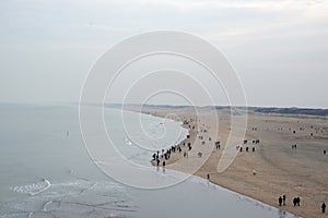 People Walking On The Beach Of Scheveningen The Netherlands 28-12-2019