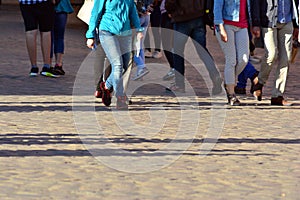 People walking on big city street, blurred motion crossing abstract