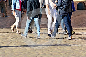 People walking on big city street, blurred motion crossing abstract