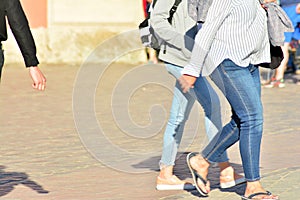 People walking on big city street, blurred motion crossing abstract